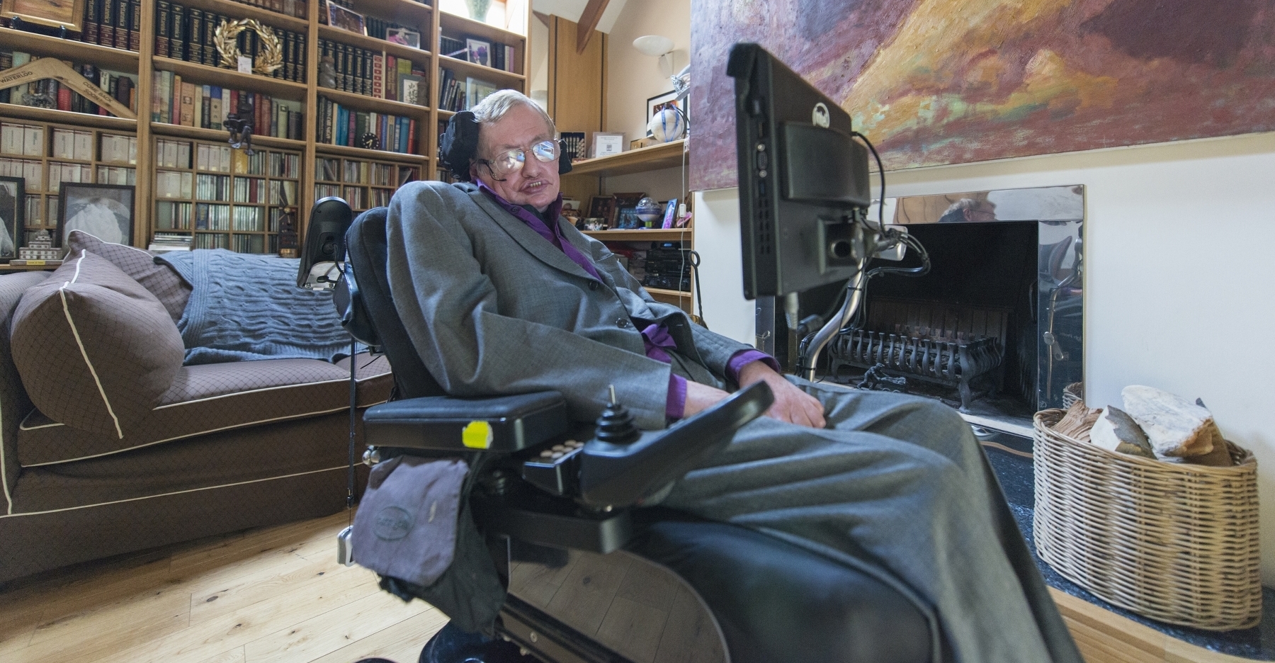 Stephen Hawking in his home library (Credit: PCWorld.com)
