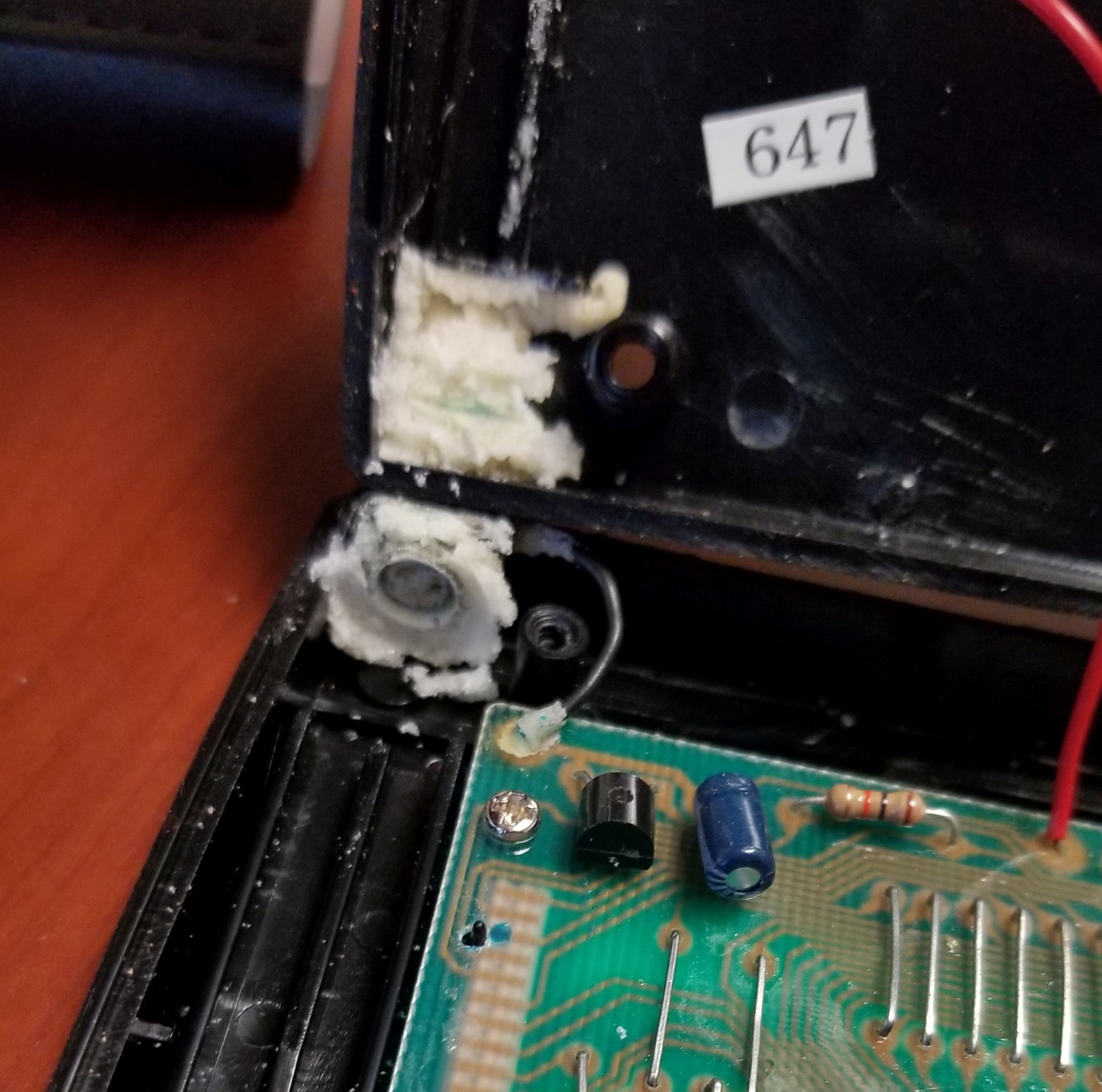 Battery corrosion in a handheld LCD billiards game